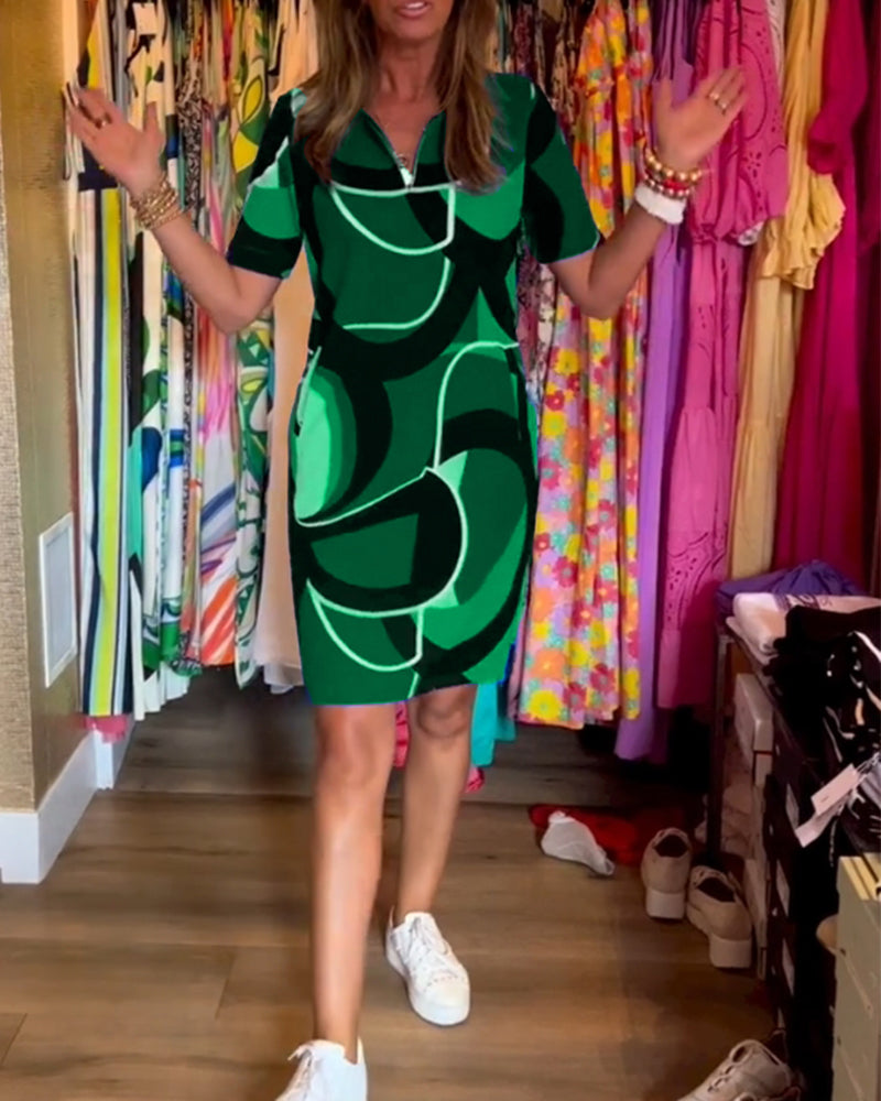 Merche Kleid mit Druck und V-Ausschnitt