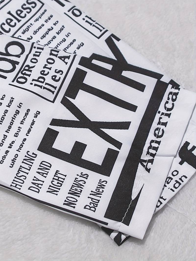 – hemdblusenkleid mit zeitungsdruck