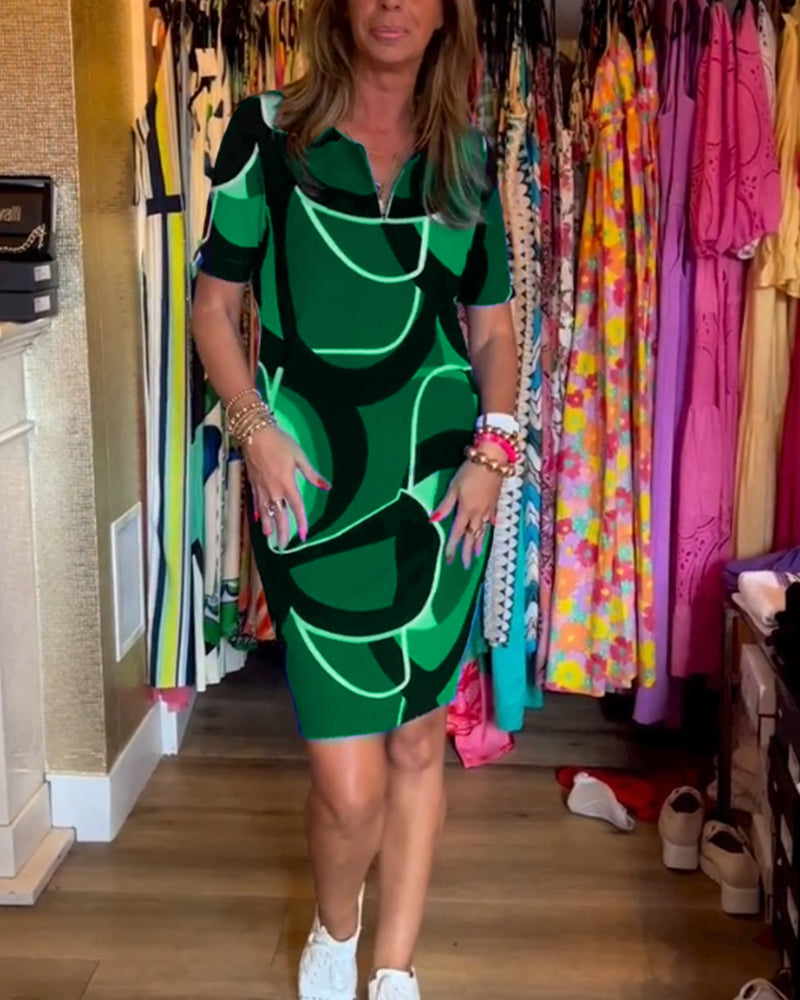 Merche Kleid mit Druck und V-Ausschnitt