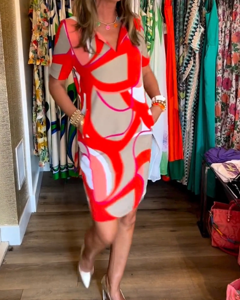 Merche Kleid mit Druck und V-Ausschnitt