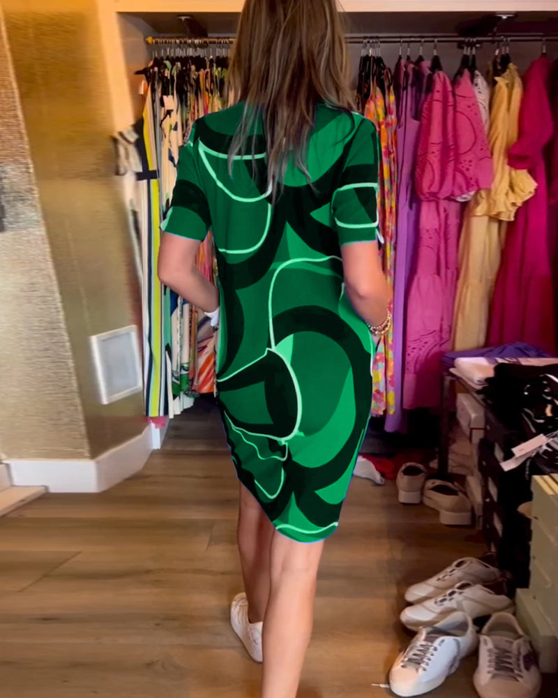 Merche Kleid mit Druck und V-Ausschnitt