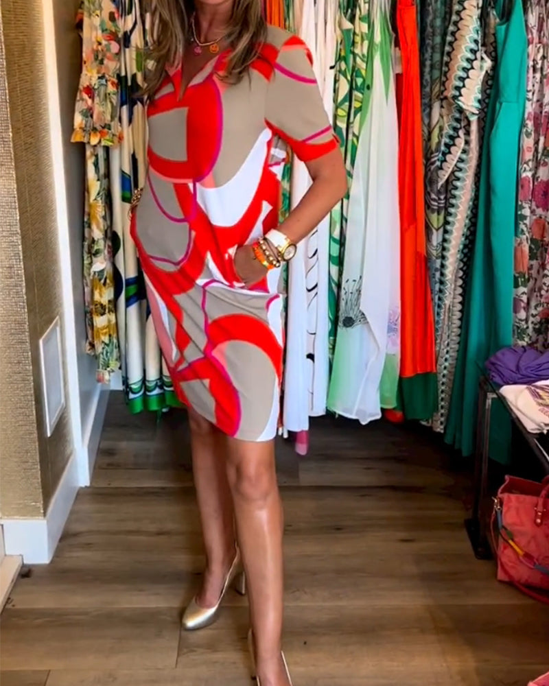 Merche Kleid mit Druck und V-Ausschnitt