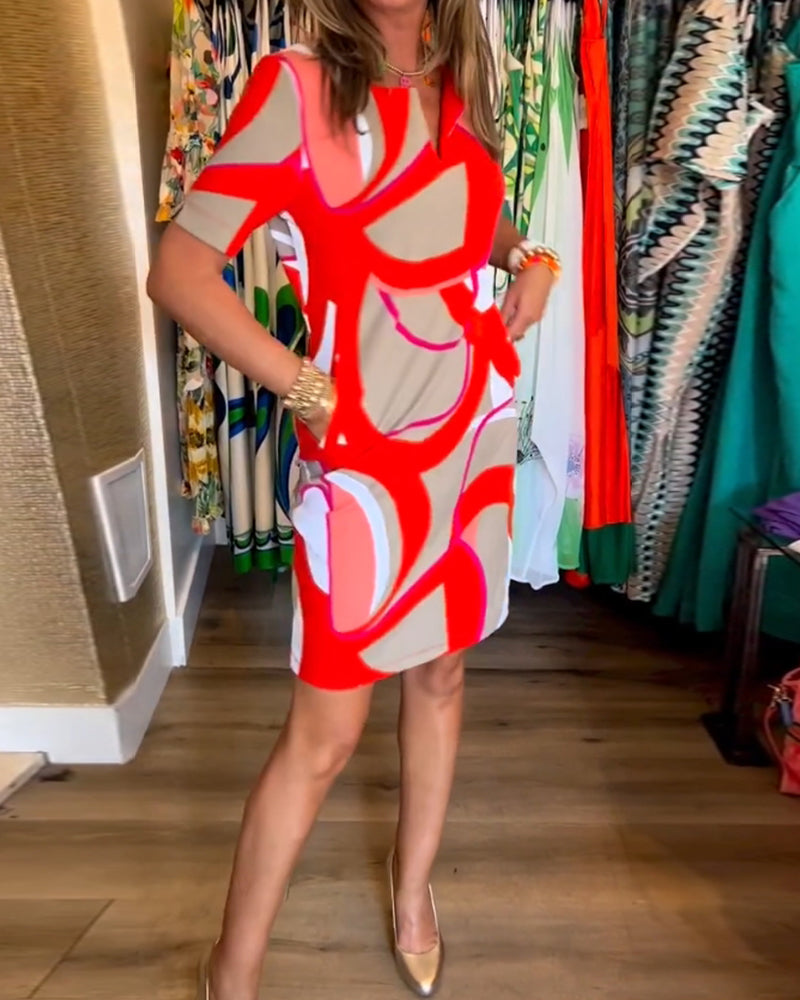 Merche Kleid mit Druck und V-Ausschnitt