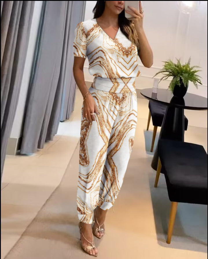Merche zweiteiliges Set mit einem kurzärmeligen Oberteil mit V-Ausschnitt und einer langen Hose, ideal für Partys
