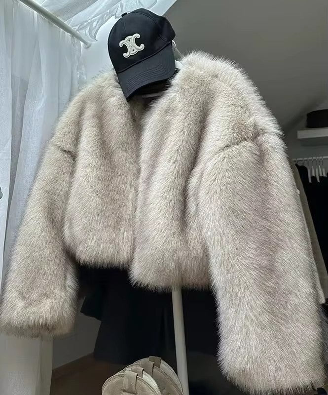 Damen Kuschelige Kunstpelzjacke mit offenem Schnitt Merchesia