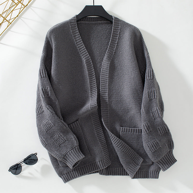 Damen weit geschnittene Strickjacke mit Taschen und strukturiertem Ärmel Merchesia