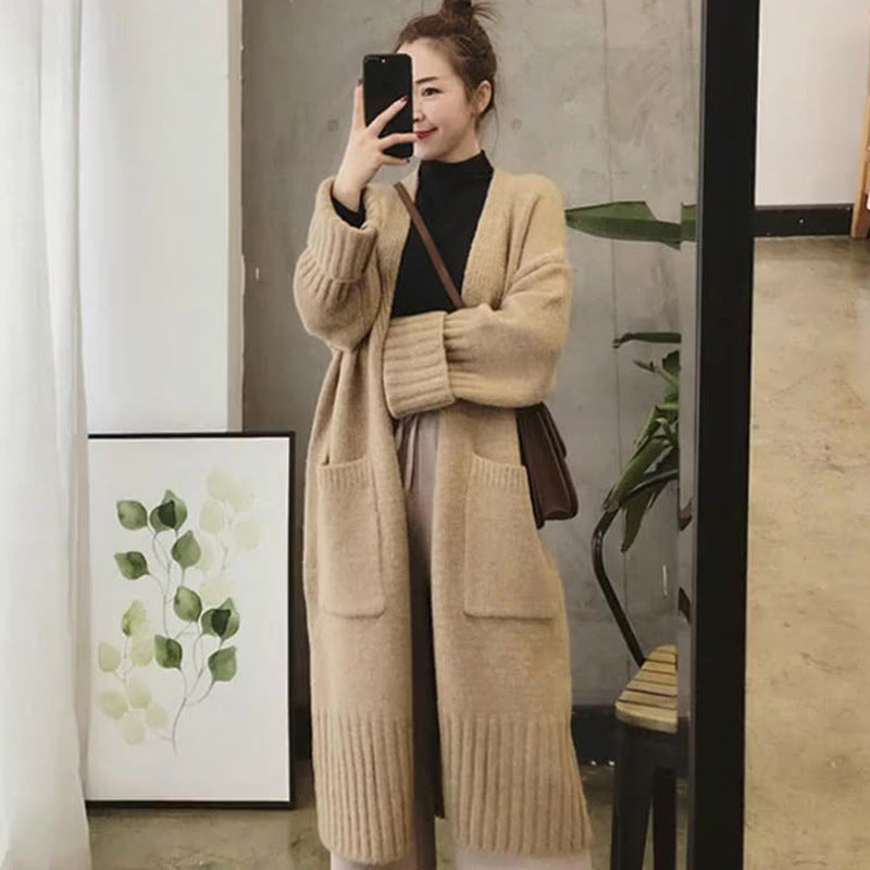 Damen Oversized Strickmantel mit praktischen Taschen und tiefem V-Ausschnitt Merchesia