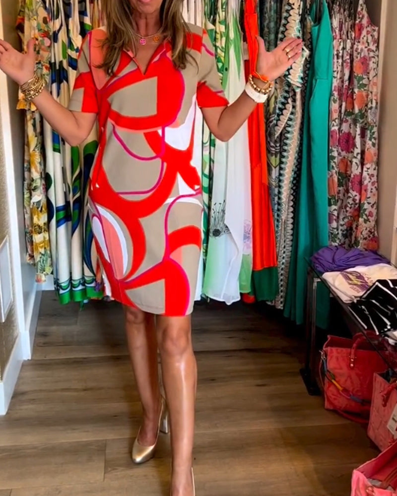 Merche Kleid mit Druck und V-Ausschnitt