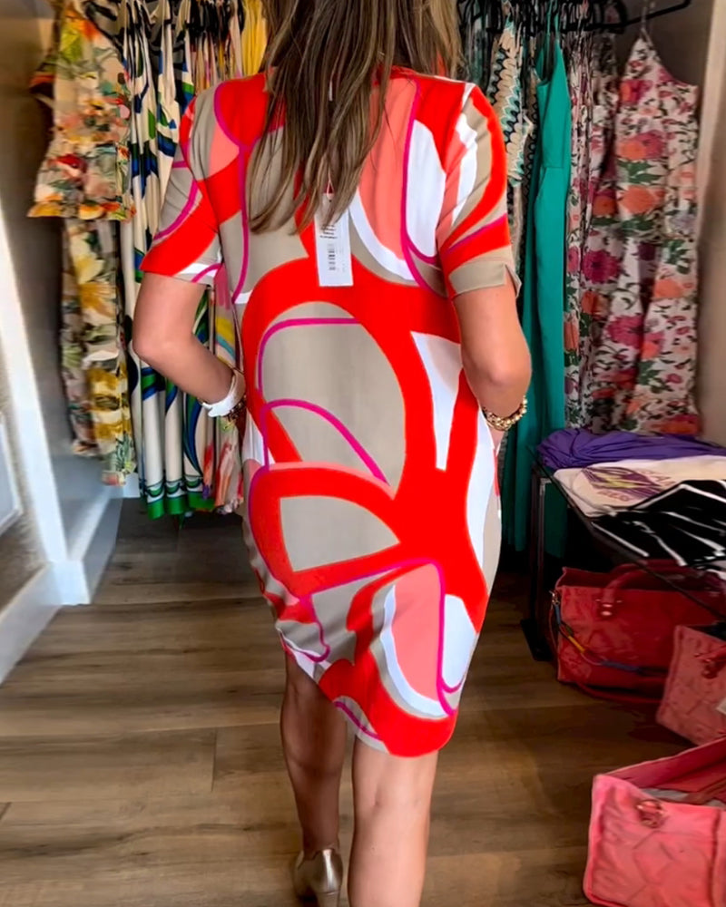 Merche Kleid mit Druck und V-Ausschnitt