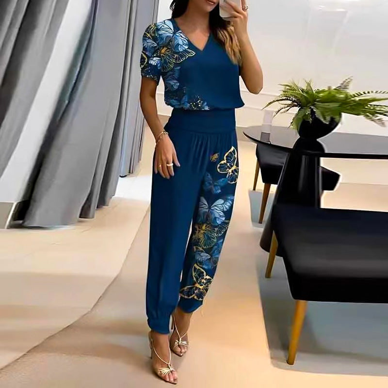 Merche zweiteiliges Set mit einem kurzärmeligen Oberteil mit V-Ausschnitt und einer langen Hose, ideal für Partys