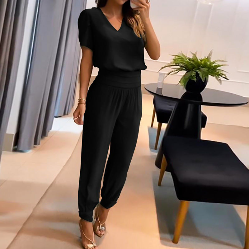 Merche zweiteiliges Set mit einem kurzärmeligen Oberteil mit V-Ausschnitt und einer langen Hose, ideal für Partys