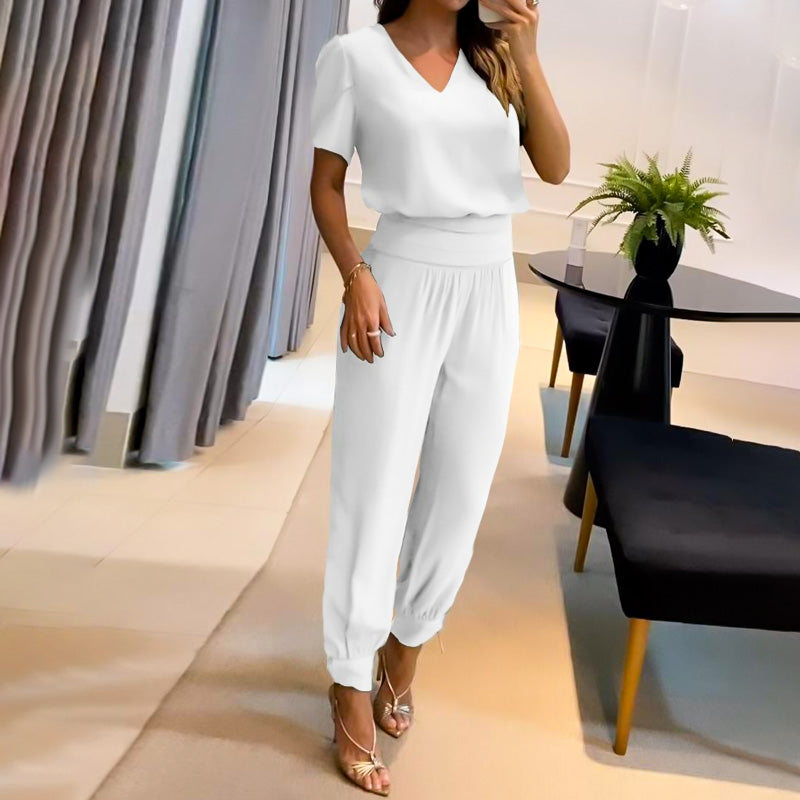 Merche zweiteiliges Set mit einem kurzärmeligen Oberteil mit V-Ausschnitt und einer langen Hose, ideal für Partys