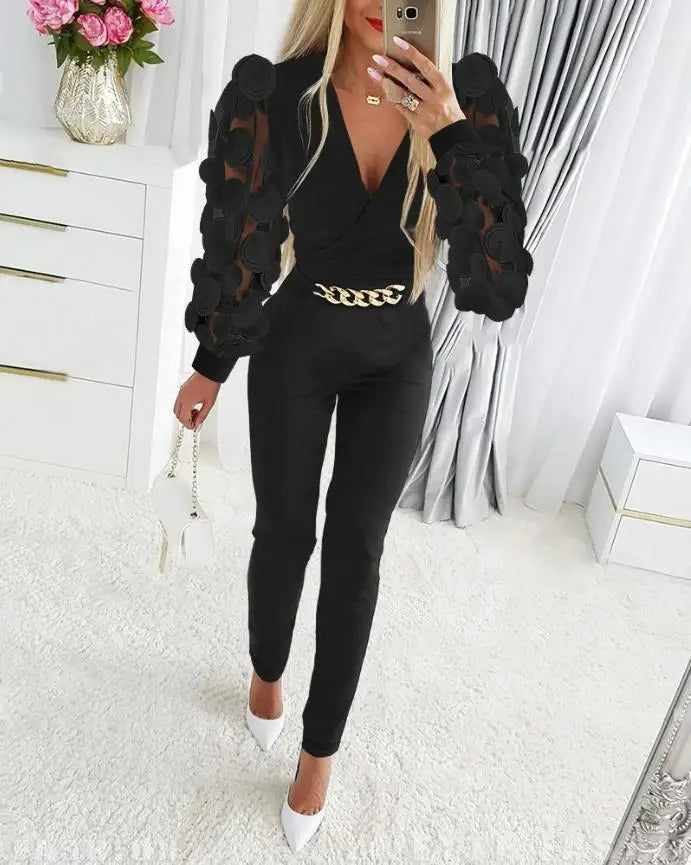 Merche Jumpsuit mit schmalen transparenten Ärmeln und Hohlraumdruck