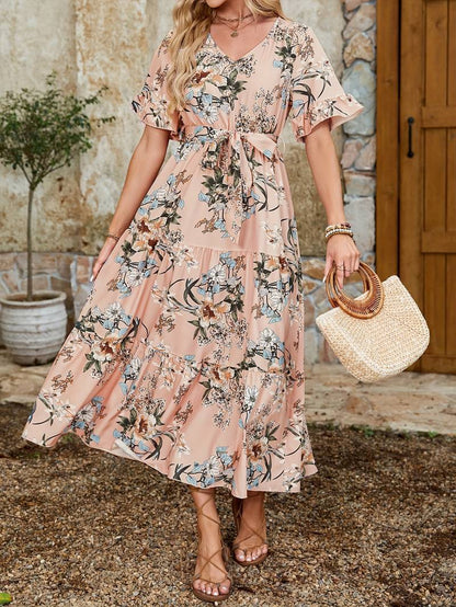 – kurzärmliges rüschenkleid mit blumendruck und v-ausschnitt
