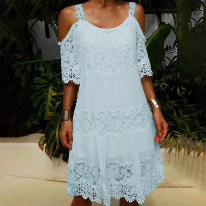 Merche Sommerkleid mit gesticktem Muster und Ausschnitt