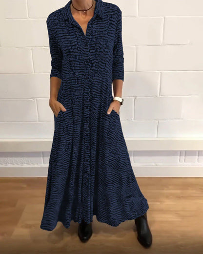 elegantes langes trapezkleid mit taschen und knopfdetails