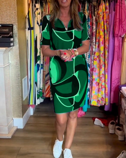 Merche Kleid mit Druck und V-Ausschnitt