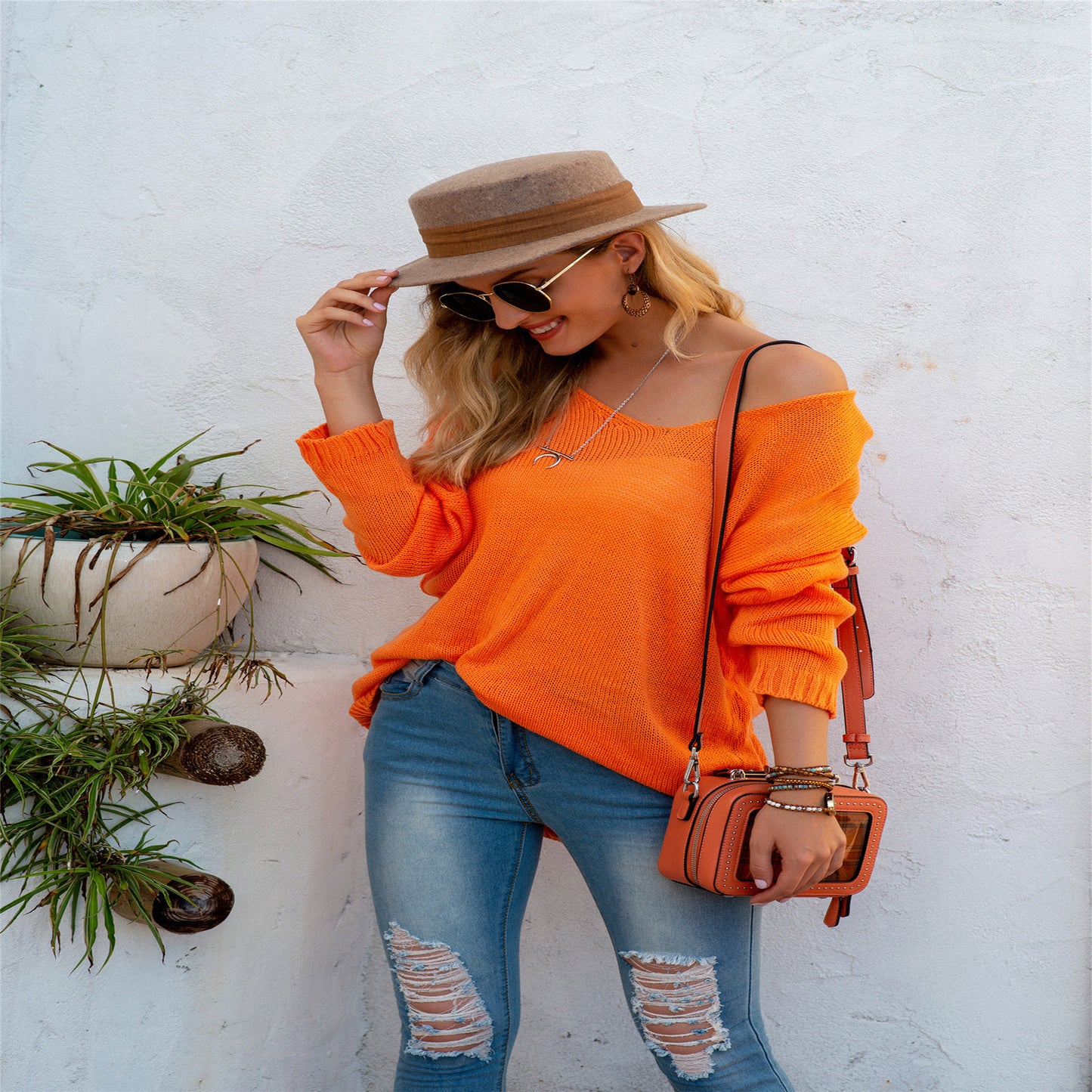 Damen lässiger V-Pullover aus luftiger Strickstruktur Merchesia