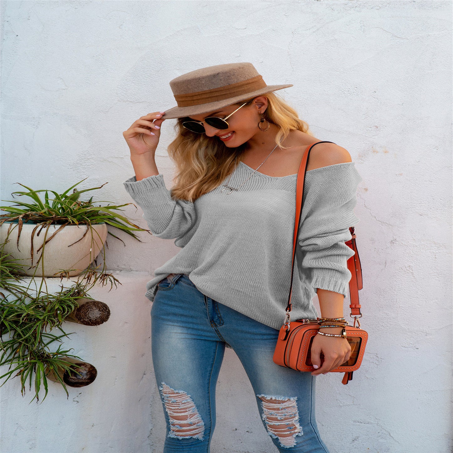 Damen lässiger V-Pullover aus luftiger Strickstruktur Merchesia