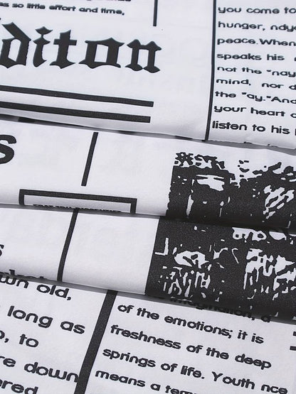– hemdblusenkleid mit zeitungsdruck