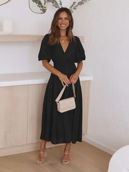 kleid mit v-ausschnitt und puffärmeln