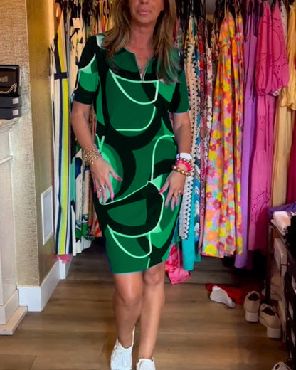 Merche Kleid mit Druck und V-Ausschnitt