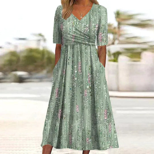 – grünes midikleid mit pflanzendruck