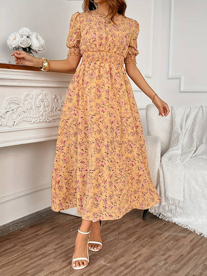 – kleid mit blumendruck und rundhalsausschnitt für frühling und sommer