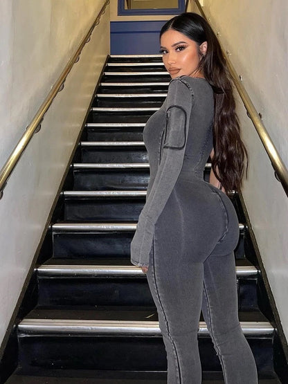 Merche grauer Jumpsuit mit einzelnen langen Ärmeln und Schultern