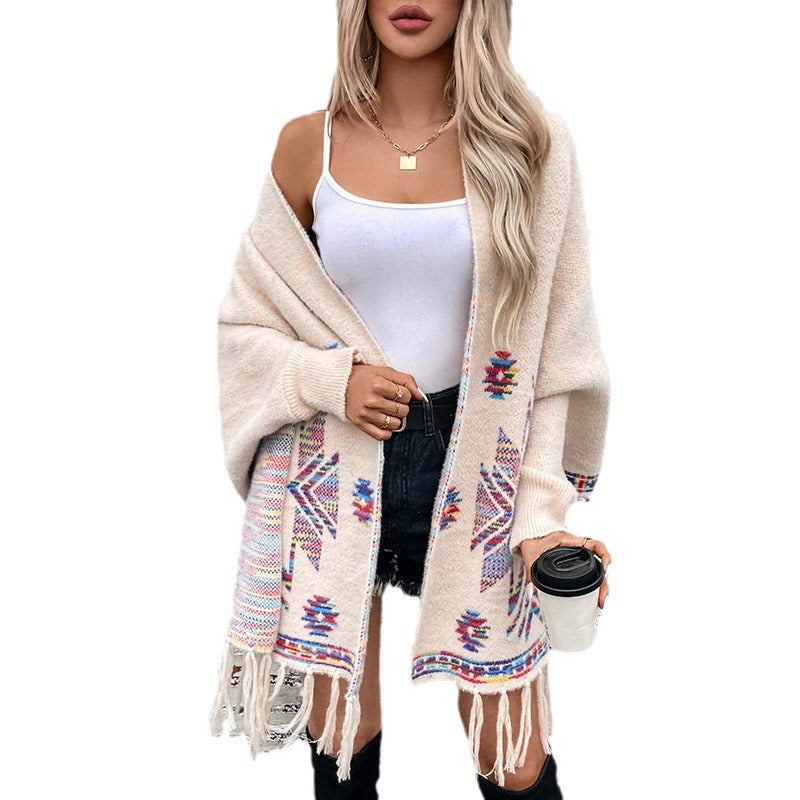 Damen Strickponcho mit buntem Navajo-Muster und fransigem Saum Merchesia