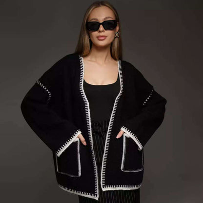 Damen gemütlicher Strickcardigan mit tiefem V-Ausschnitt und praktischen Taschen Merchesia