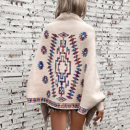 Damen Strickponcho mit buntem Navajo-Muster und fransigem Saum Merchesia