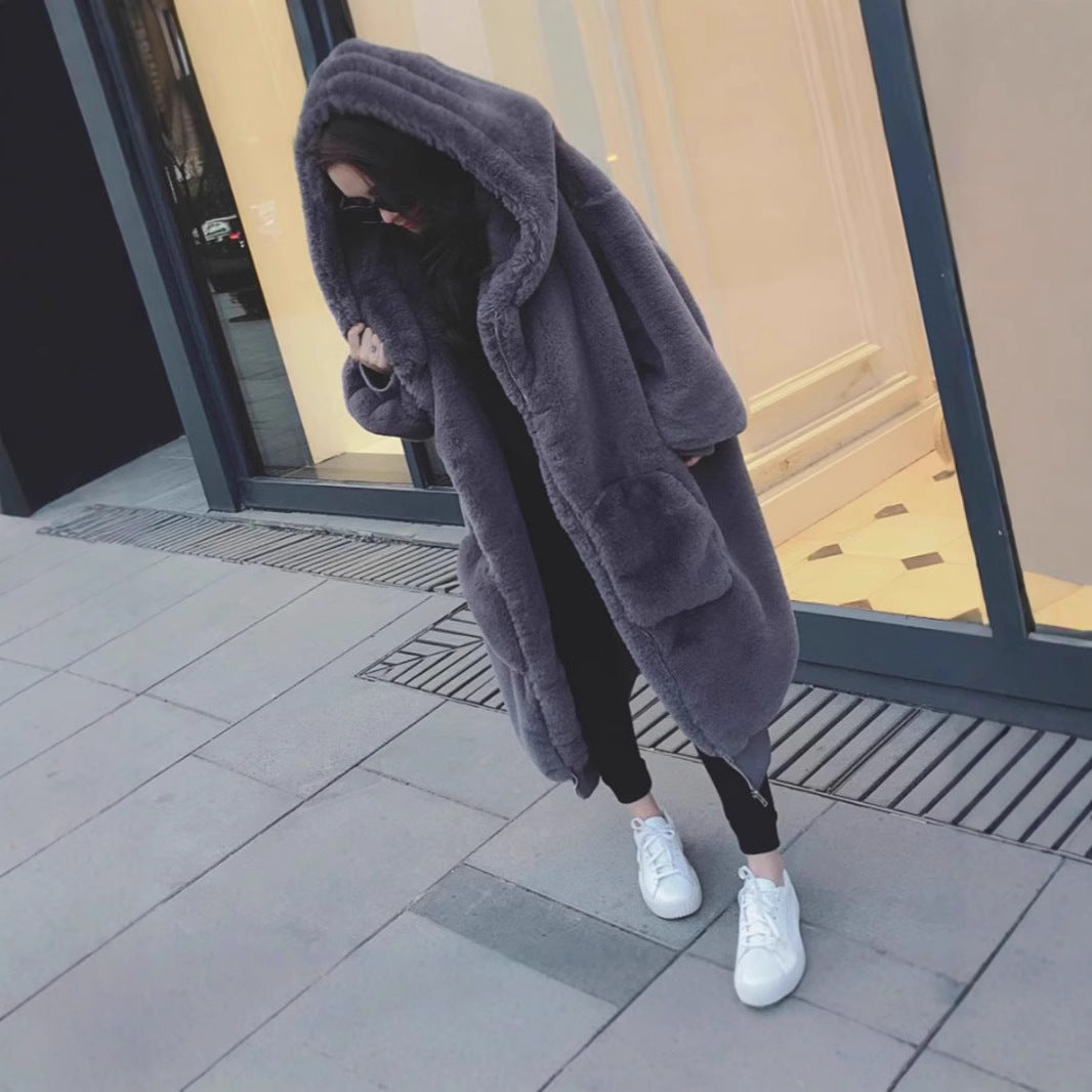 Damen Übergroßer Kunstfellmantel mit Kapuze und Taschen Merchesia