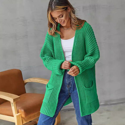 Damen Grobstrickjacke mit tiefem V-Ausschnitt und praktischen Taschen Merchesia