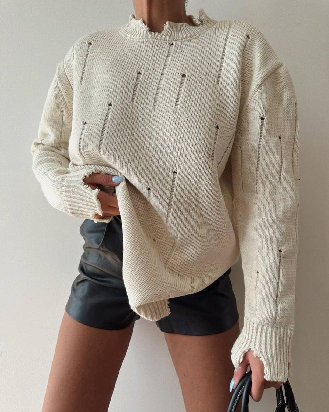 Damen Grober Strickpullover mit distressed Details Merchesia