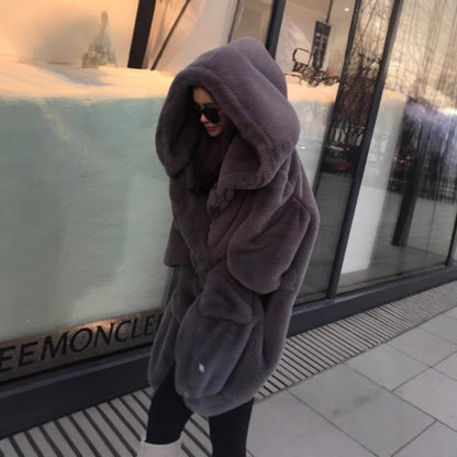 Damen Übergroßer Kunstfellmantel mit Kapuze und Taschen Merchesia