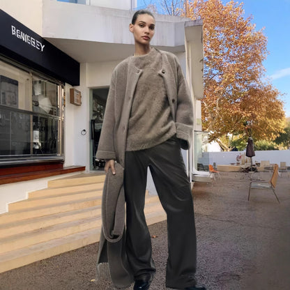 Damen elegante und warme Wickeljacke mit Schalkragen und Fransen Merchesia