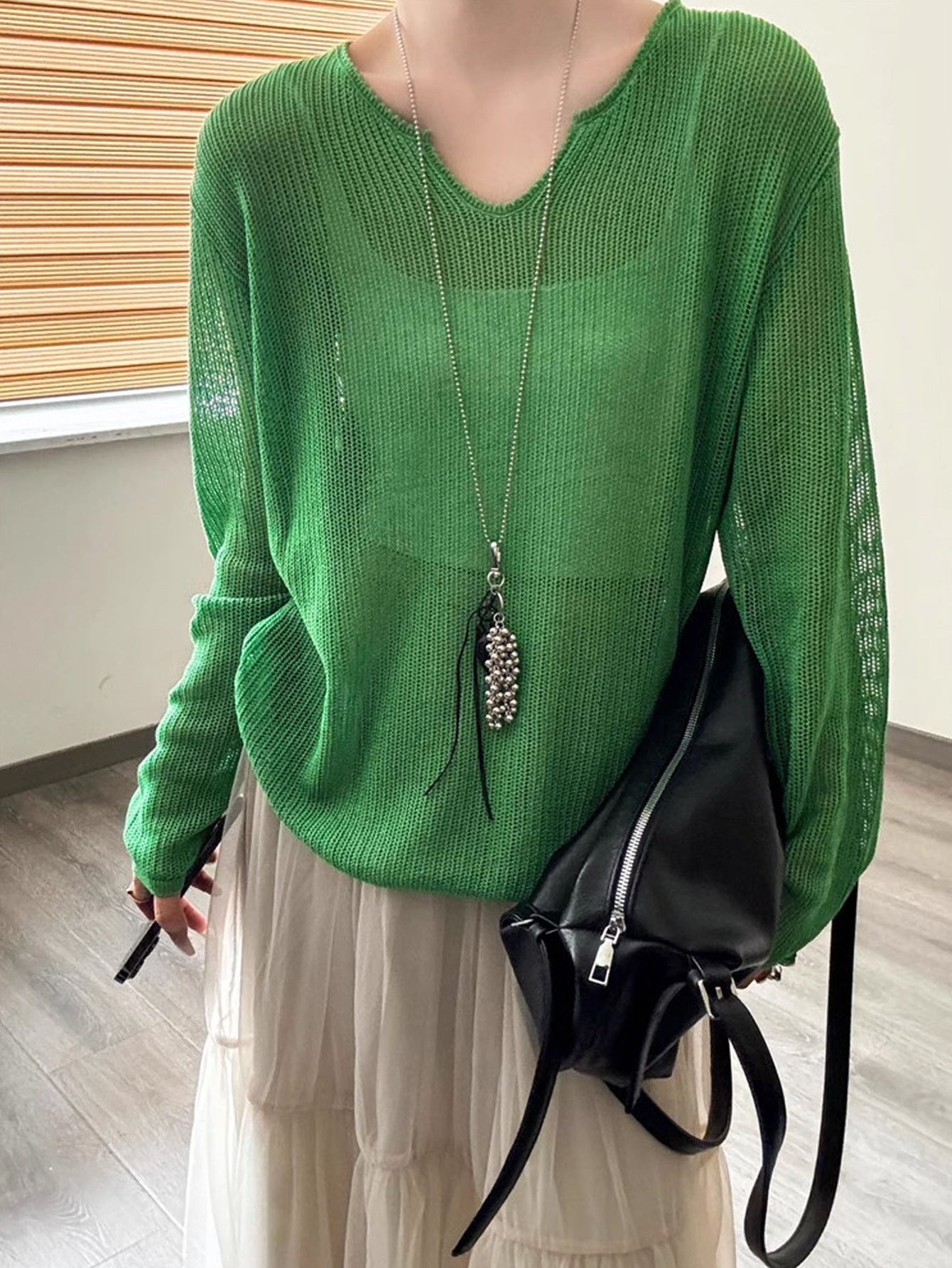 Damen luftiger Strickpullover mit V-Ausschnitt und lässigem Schnitt Merchesia