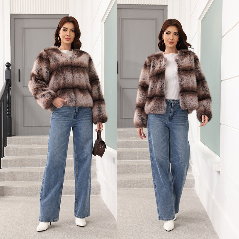 Damen Elegante und warme Kunstpelzjacke Merchesia