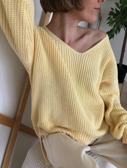Damen lässiger Strickpullover mit tiefem V-Ausschnitt und seitlichen Schlitzen Merchesia