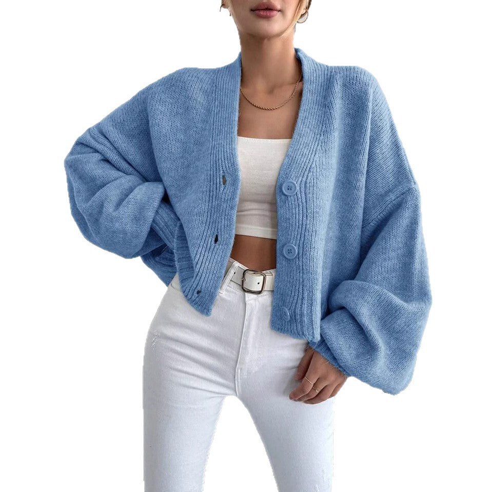 Damen oversized Strickjacke mit voluminösen Ärmeln und Knopfdetails Merchesia