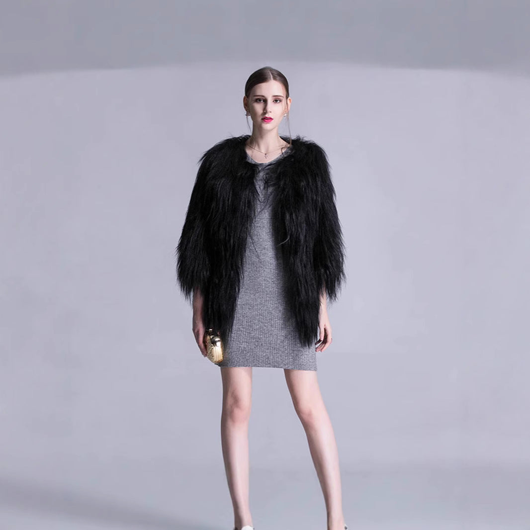 Damen Elegante Kunstpelz-Cape mit weit offenem Schnitt Merchesia