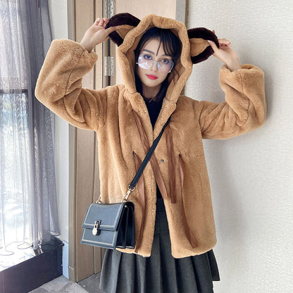 Damen Kuschelige Kunstpelzjacke mit Kapuze und Schleifendetails Merchesia