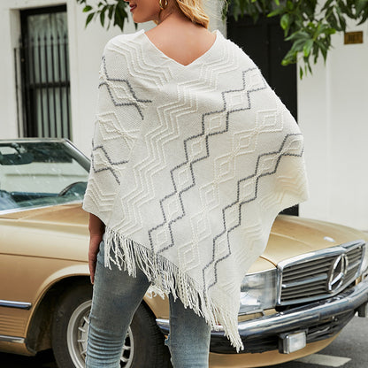 Damen eleganter Poncho mit auffälligem Strukturmuster und dekorativen Fransen Merchesia