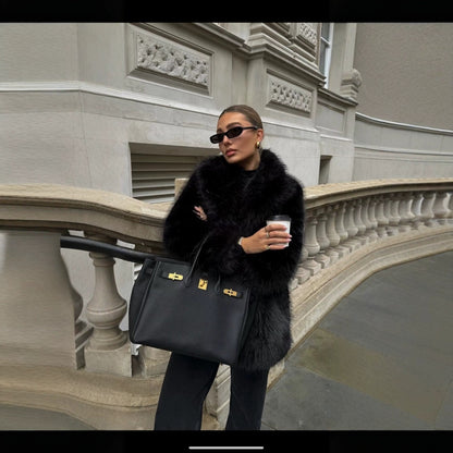 Damen Eleganter Oversized Kunstpelzmantel mit weit geschnittenen Ärmeln Merchesia