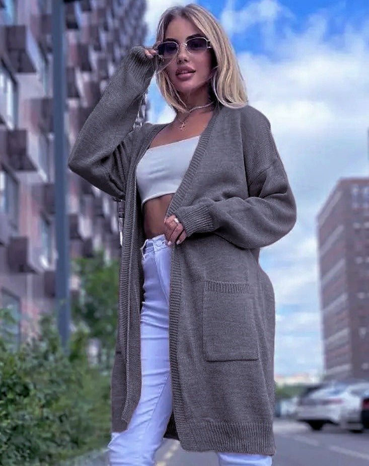 Damen gemütliche Strickjacke mit praktischen Taschen und offenem Schnitt Merchesia