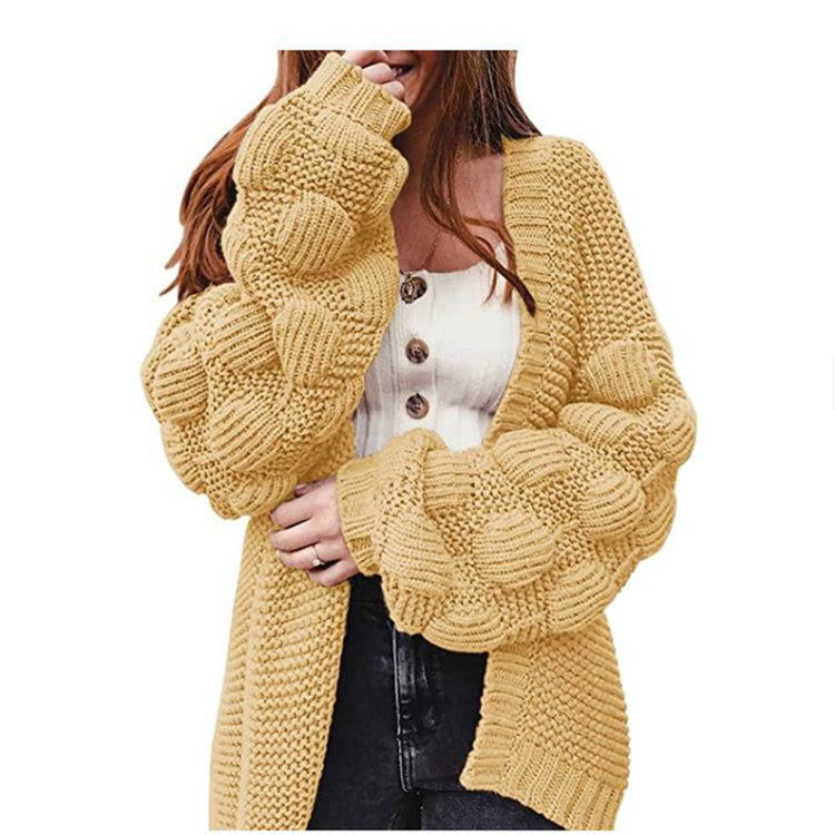Damen Strickjacke mit voluminösen Puffärmeln und feiner Struktur Merchesia