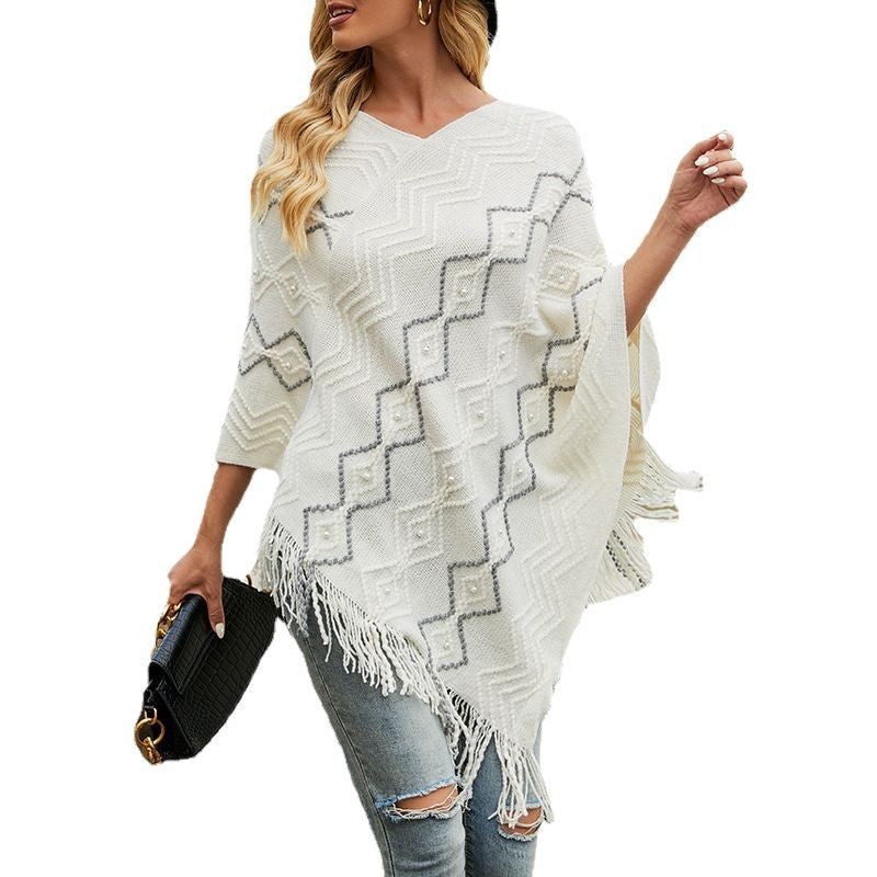 Damen eleganter Poncho mit auffälligem Strukturmuster und dekorativen Fransen Merchesia