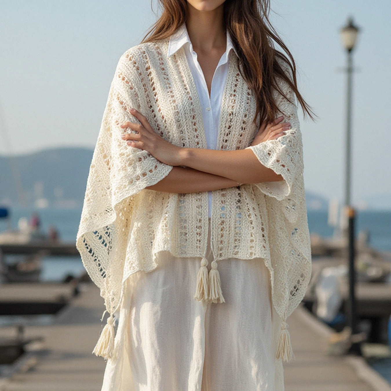 Damen luftiger Strickponcho mit Fransen Merchesia