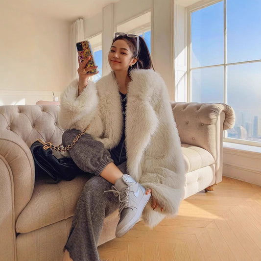 Damen Flauschige Kunstpelzjacke mit weiter Silhouette Merchesia